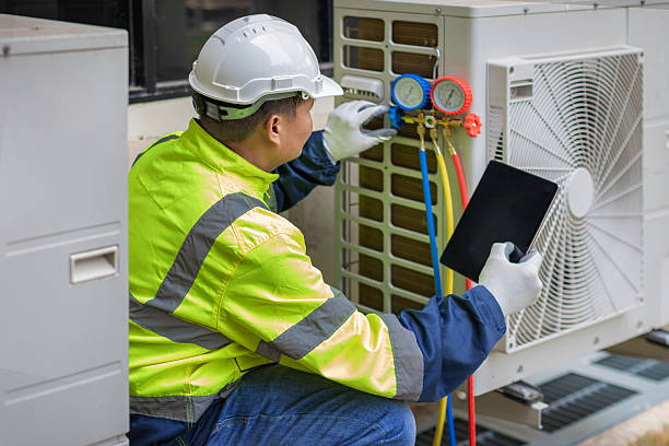 Professional Emergency Hvac Repair technician working in Hallsville, MO